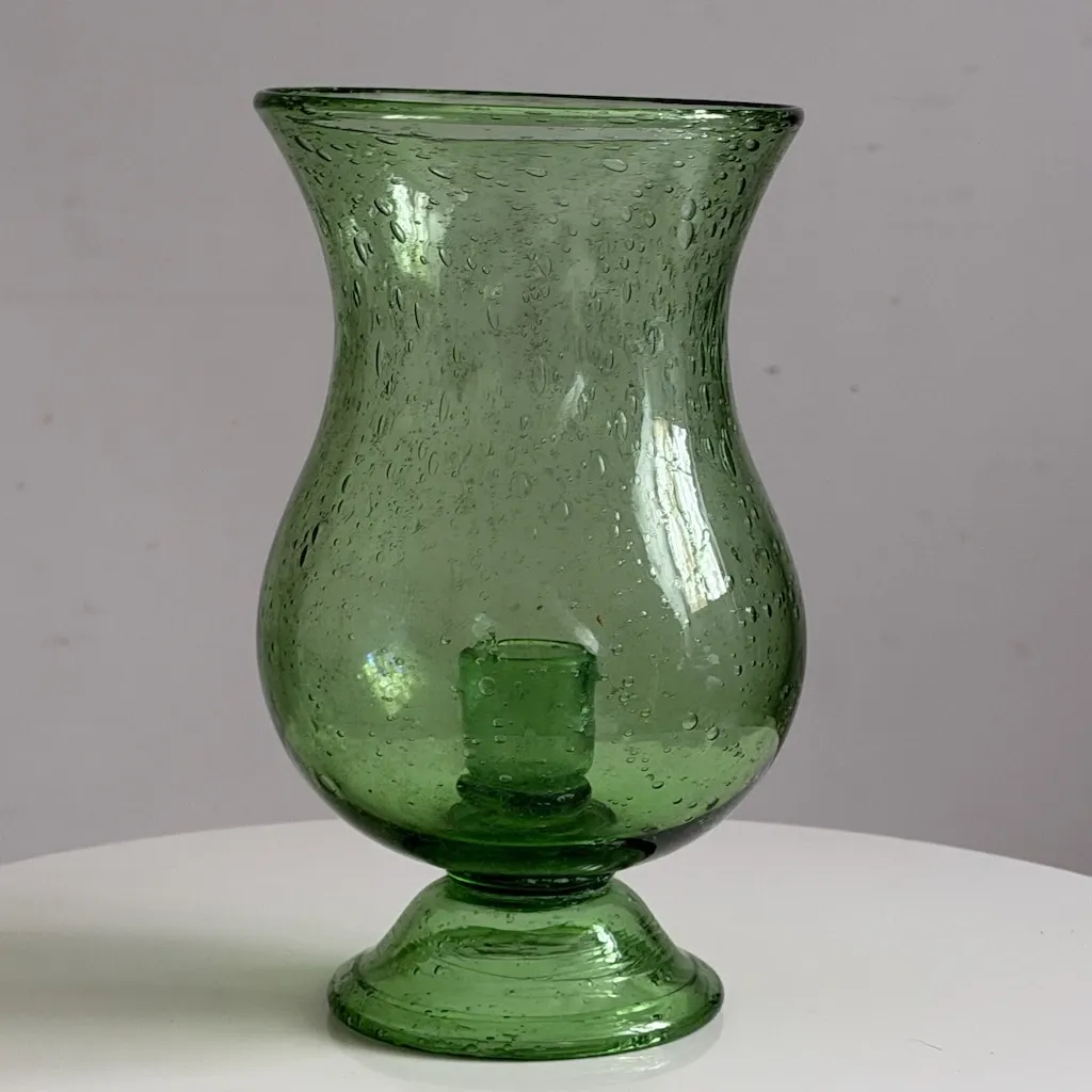 Green blown glass photophore from the Biot glassworks, height 22 cm.