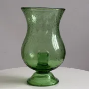 Green blown glass photophore from the Biot glassworks, height 22 cm.