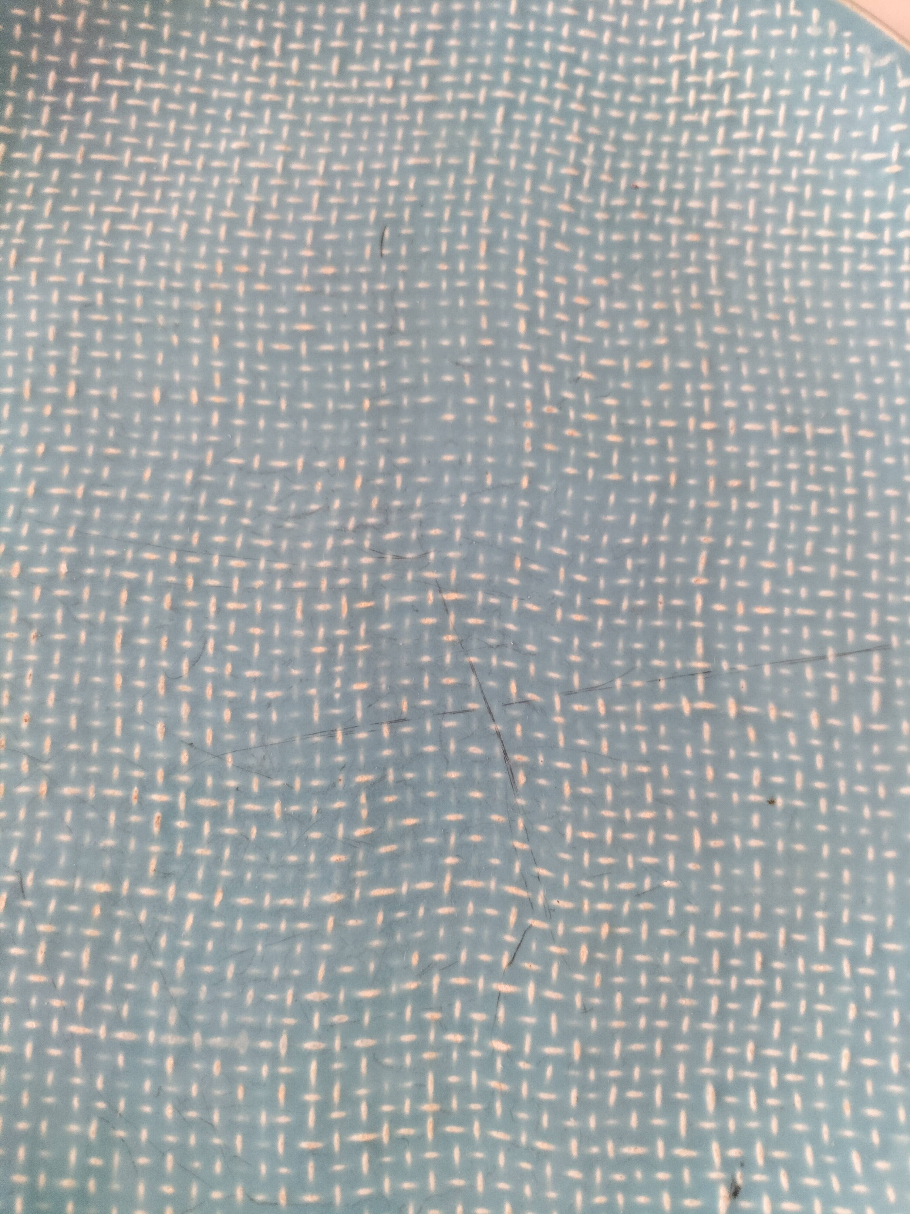 Two sugar bowls and a textured plate in turquoise and green Salins earthenware.