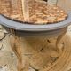 Oval coffee table in marble and wood