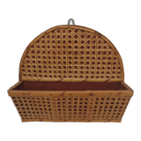Old mail rack in wood and honey-colored rattan