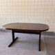 Oval dining table by Farstrup