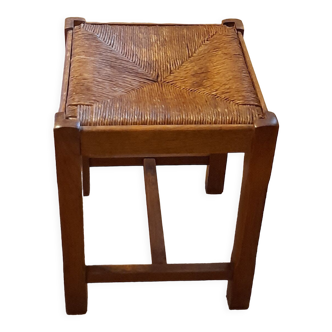 Oak stool seated in straw