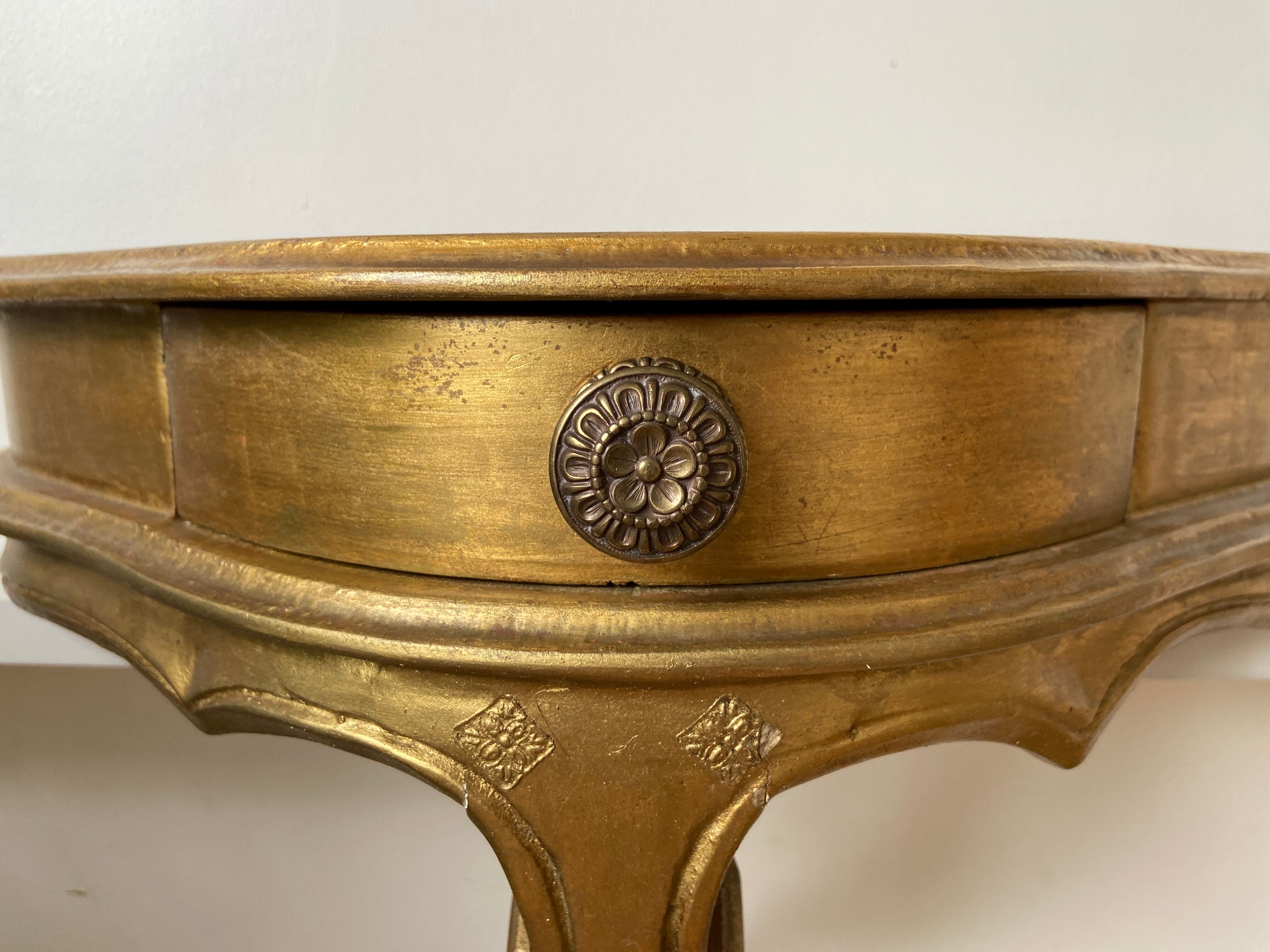 Gold wall shelf with drawer