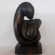 Wooden Sculpture of a Woman with Her Child