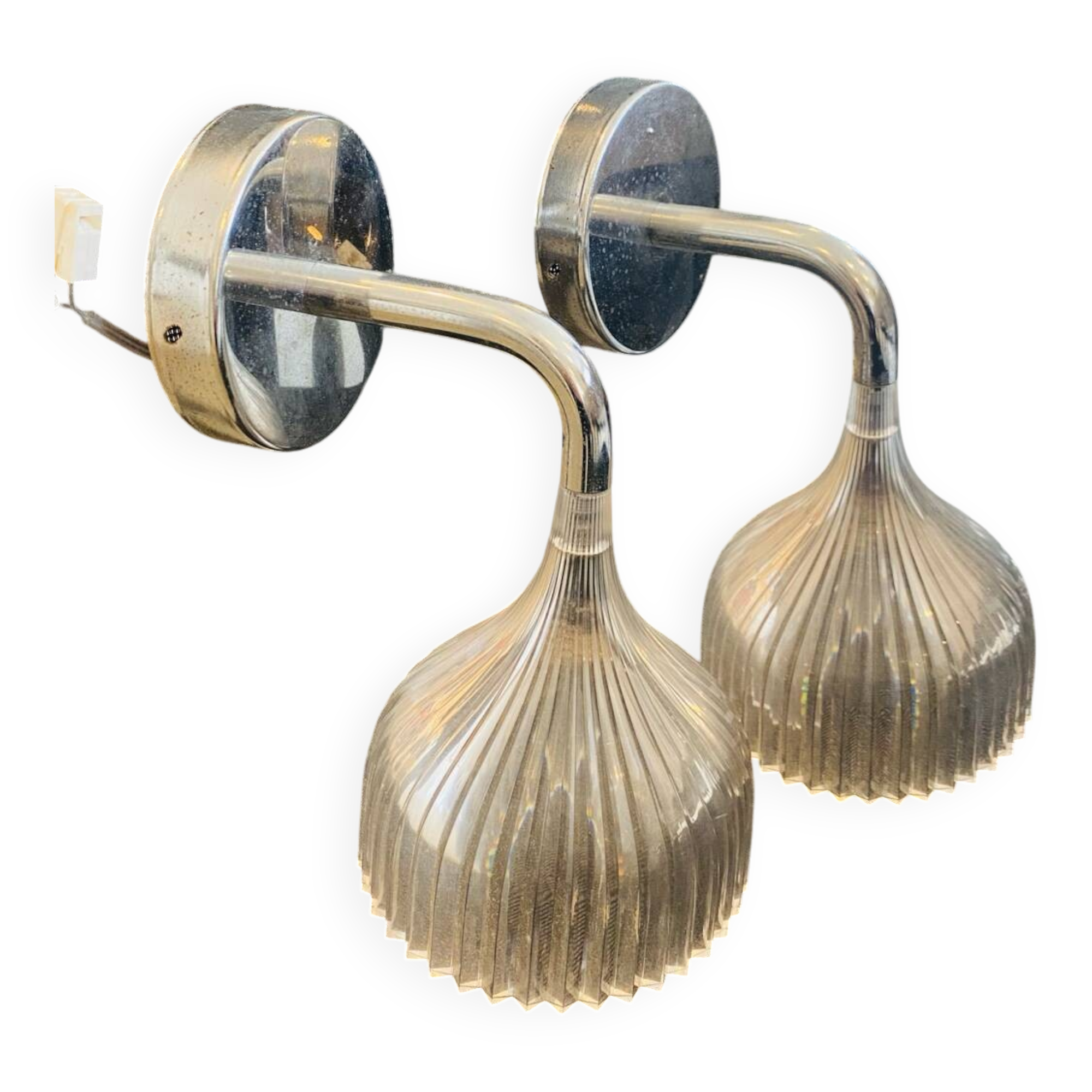 Many Kartell wall lamps.