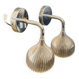 Many Kartell wall lamps.