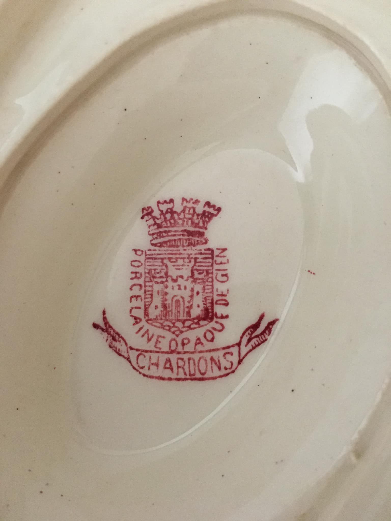Sauce boat in opaque porcelain by gien, model "thistles". old pink color.