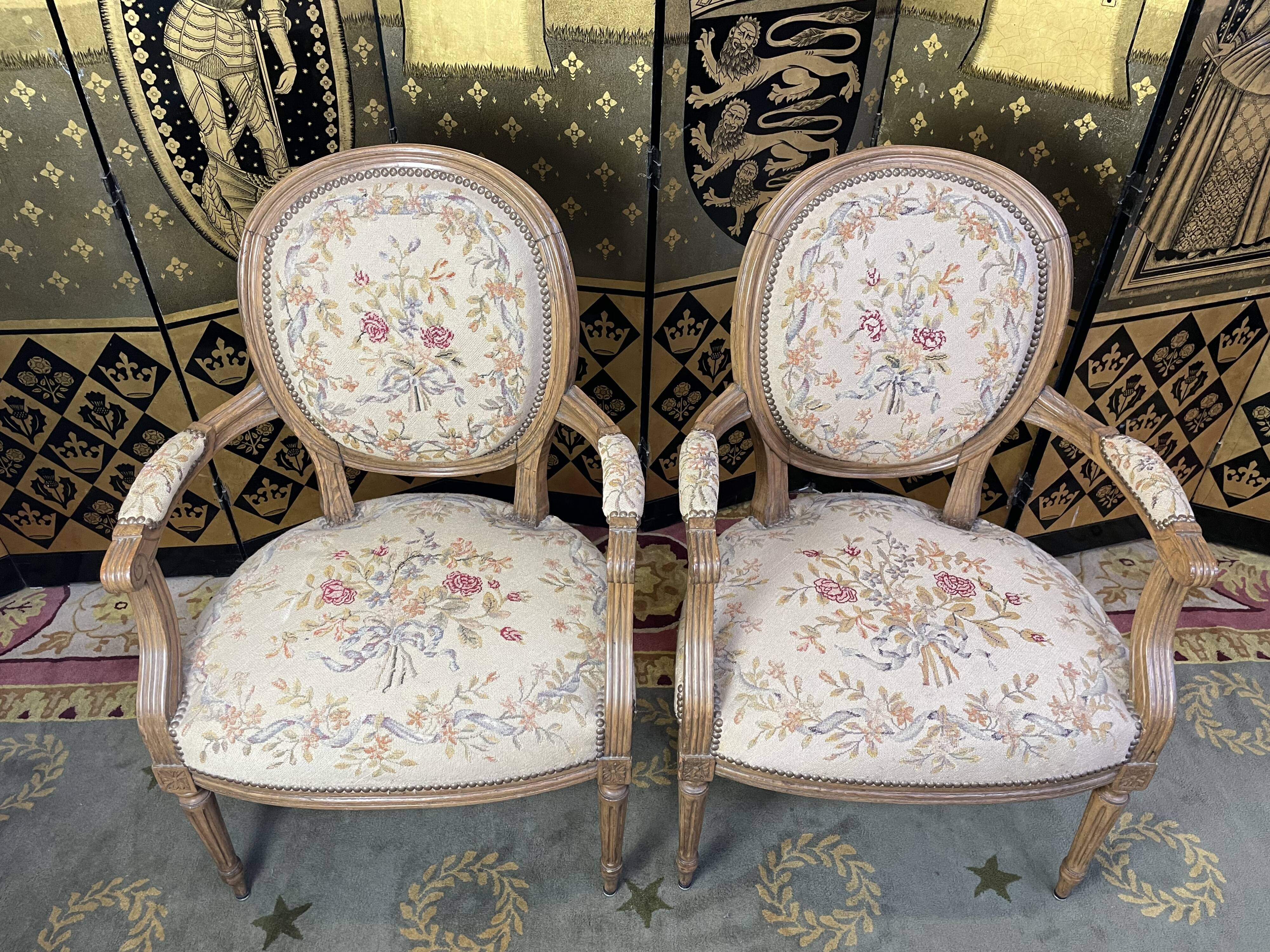 Pair of Louis XVI period medallion armchairs