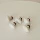 Set of 5 antique door handles in porcelain and brass.
