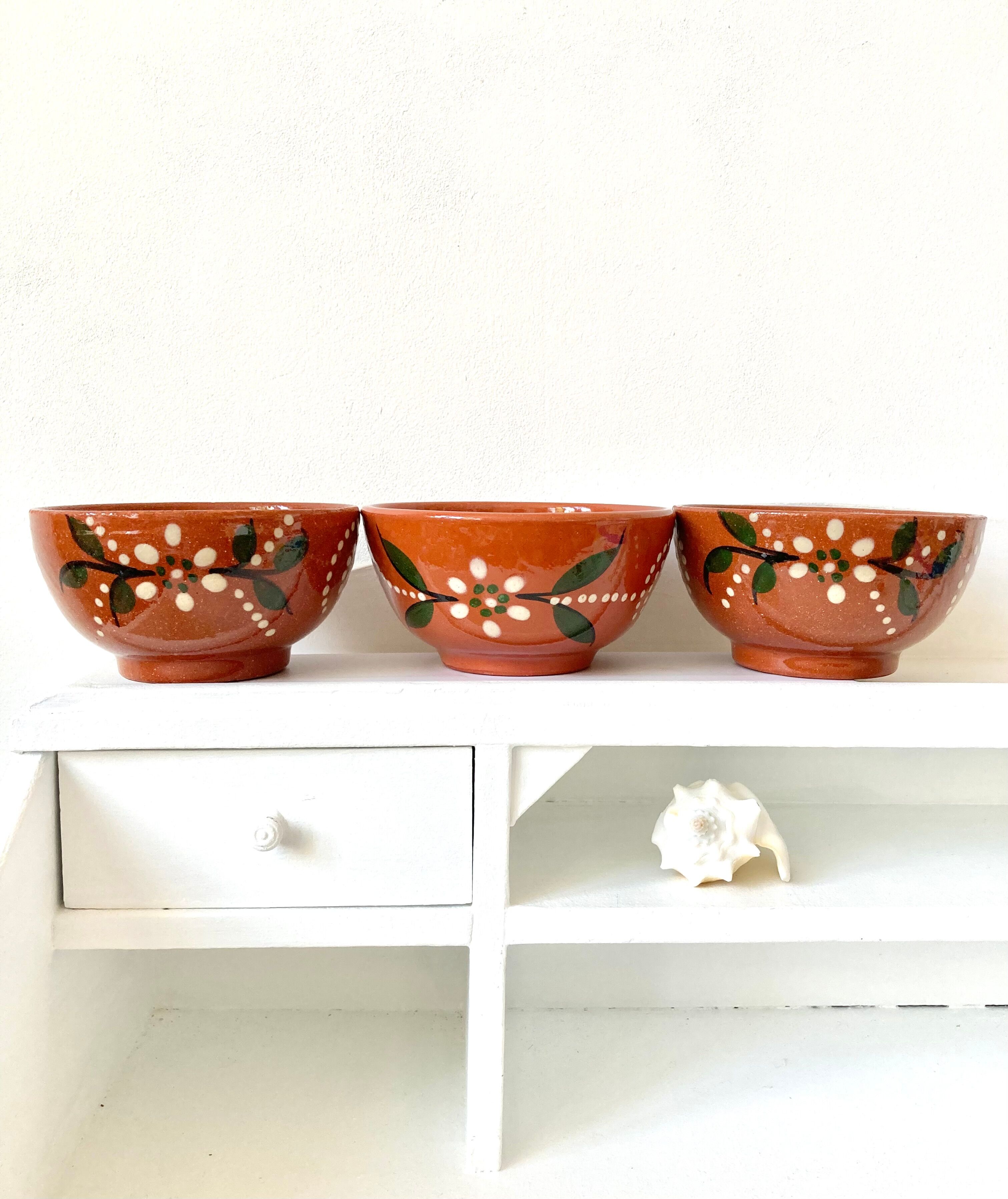 Vintage terracotta bowls decorated flowers