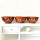 Vintage terracotta bowls decorated flowers