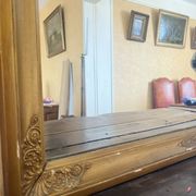 Large antique mirror in the Napoléon III style.