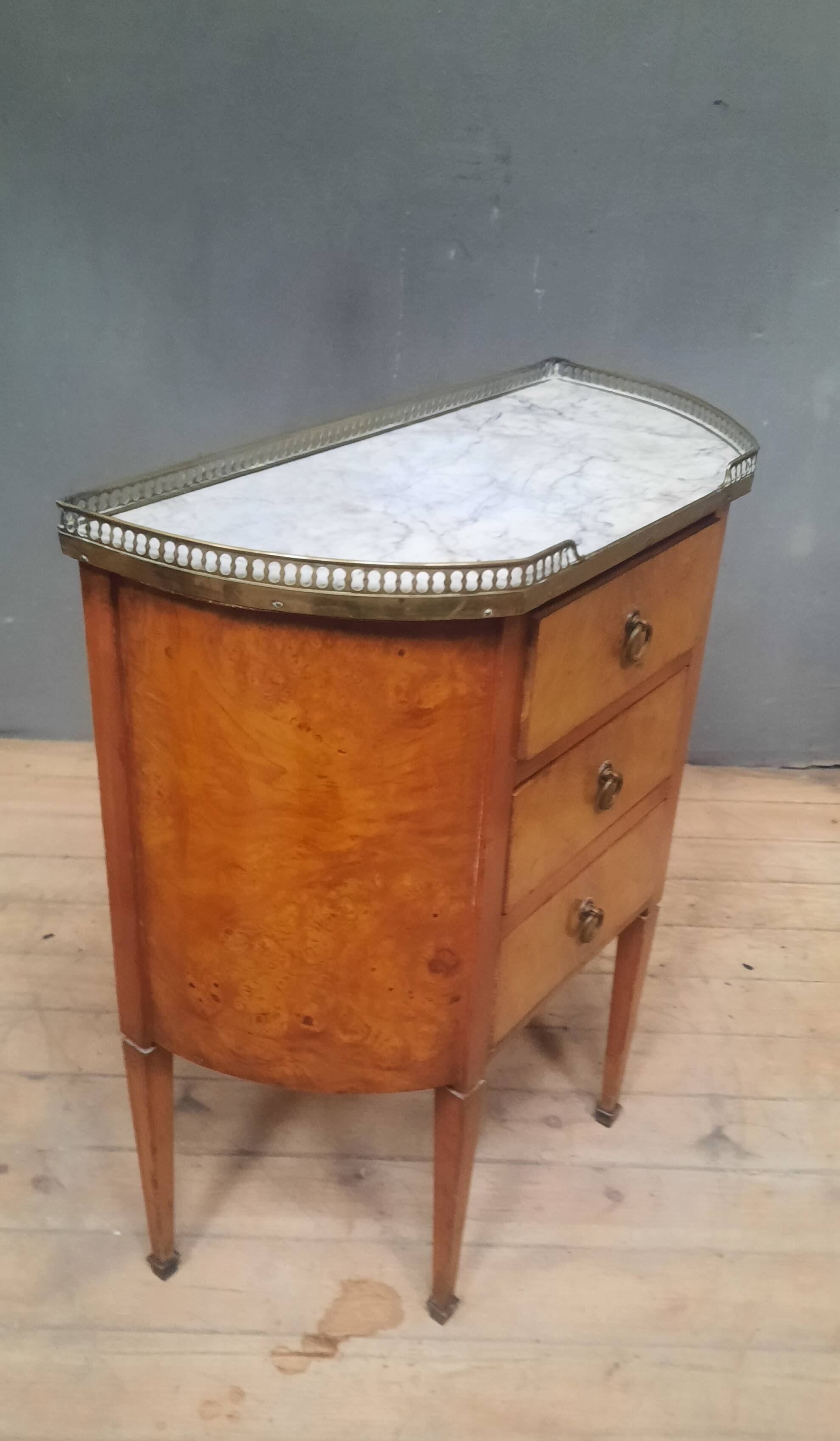 Small Louis XVI style chest of drawers with rounded sides