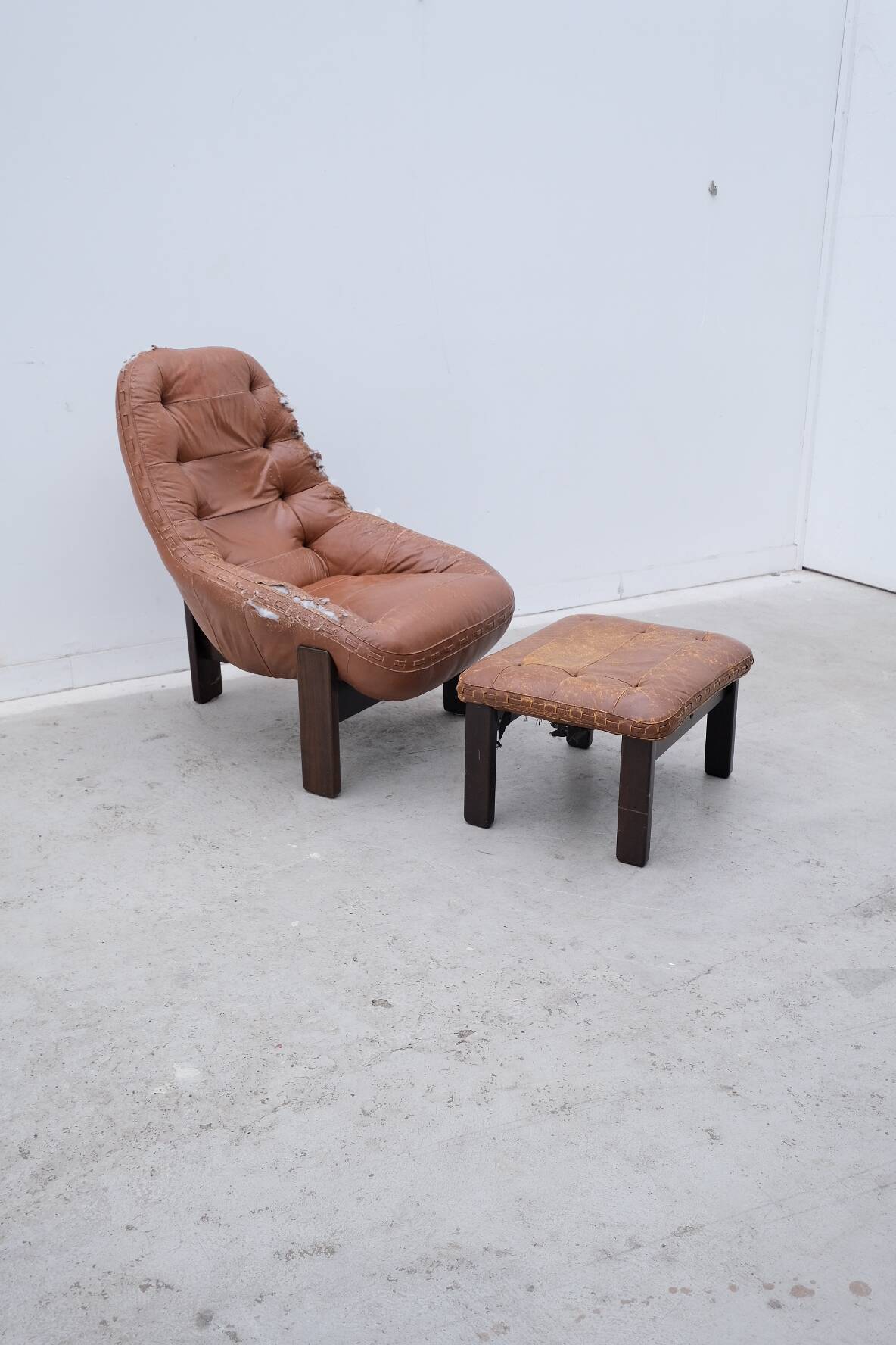 Armchair and ottoman by Jean Gillon for Probel in leather and teak, Brazil 1970