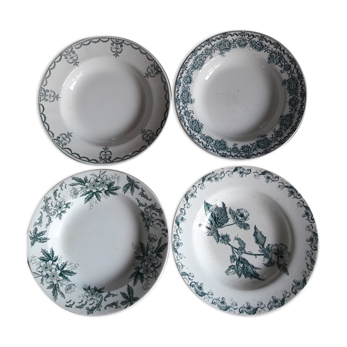Lot of four mismatched hollow plates