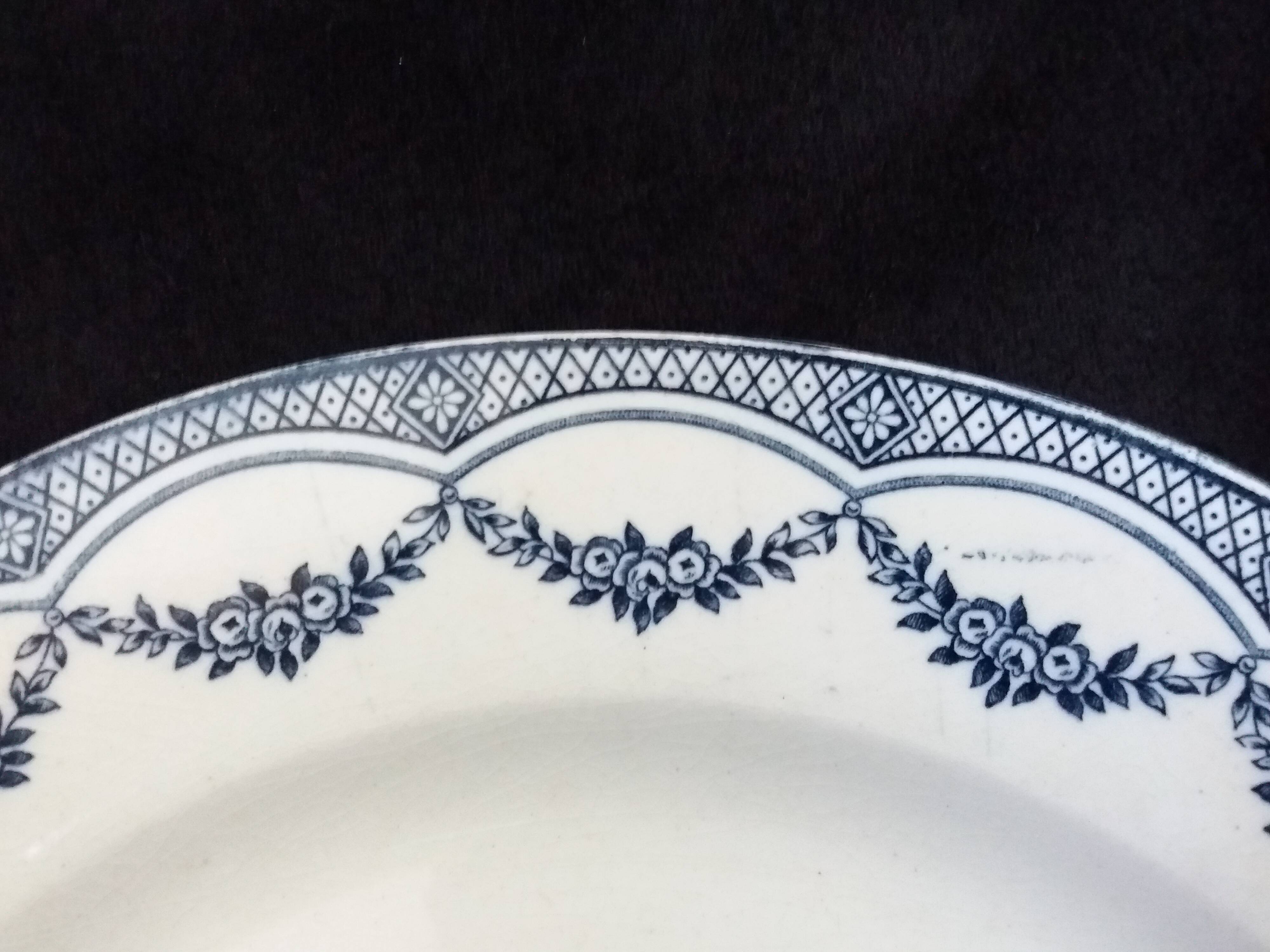 Old green and blue mismatched plates from Digoin, Salins, Moulin des Loups