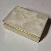 Rectangular light onyx jewellery box with brass trim, empty.