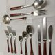 Lot of 73 Christofle cutlery, Talisman model, Chinese lacquer in Siena colour.