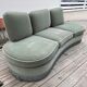 Rounded sofa with fringes