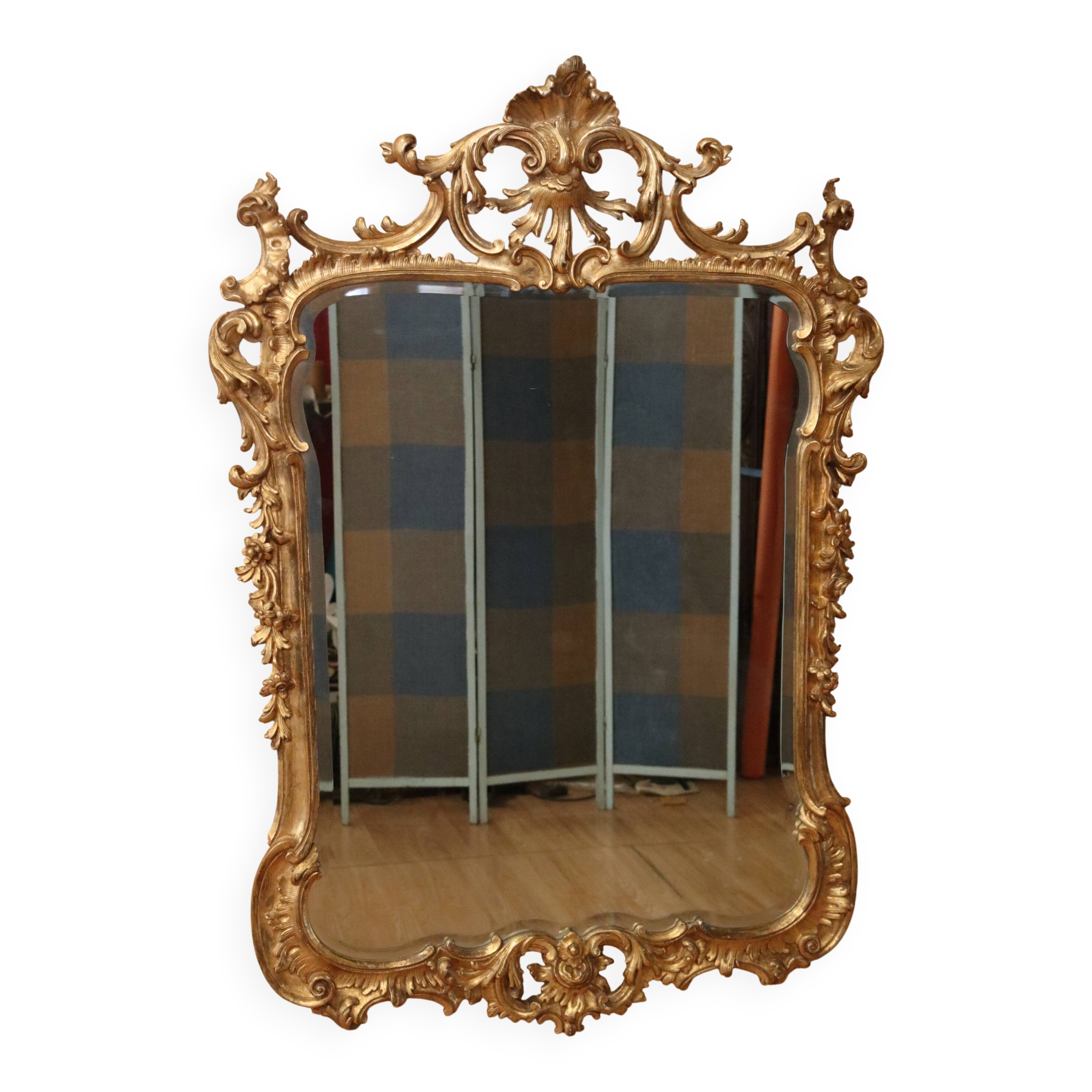 Golden wooden mirror in Louis XV style