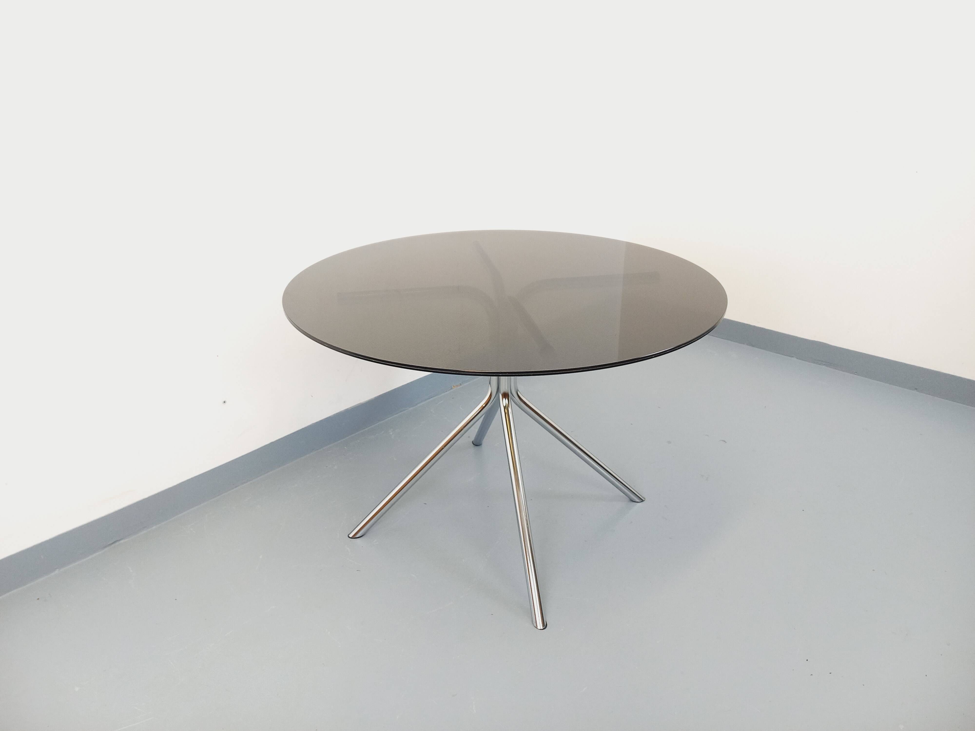Vintage dining table in smoked glass plexiglass and chrome metal.
