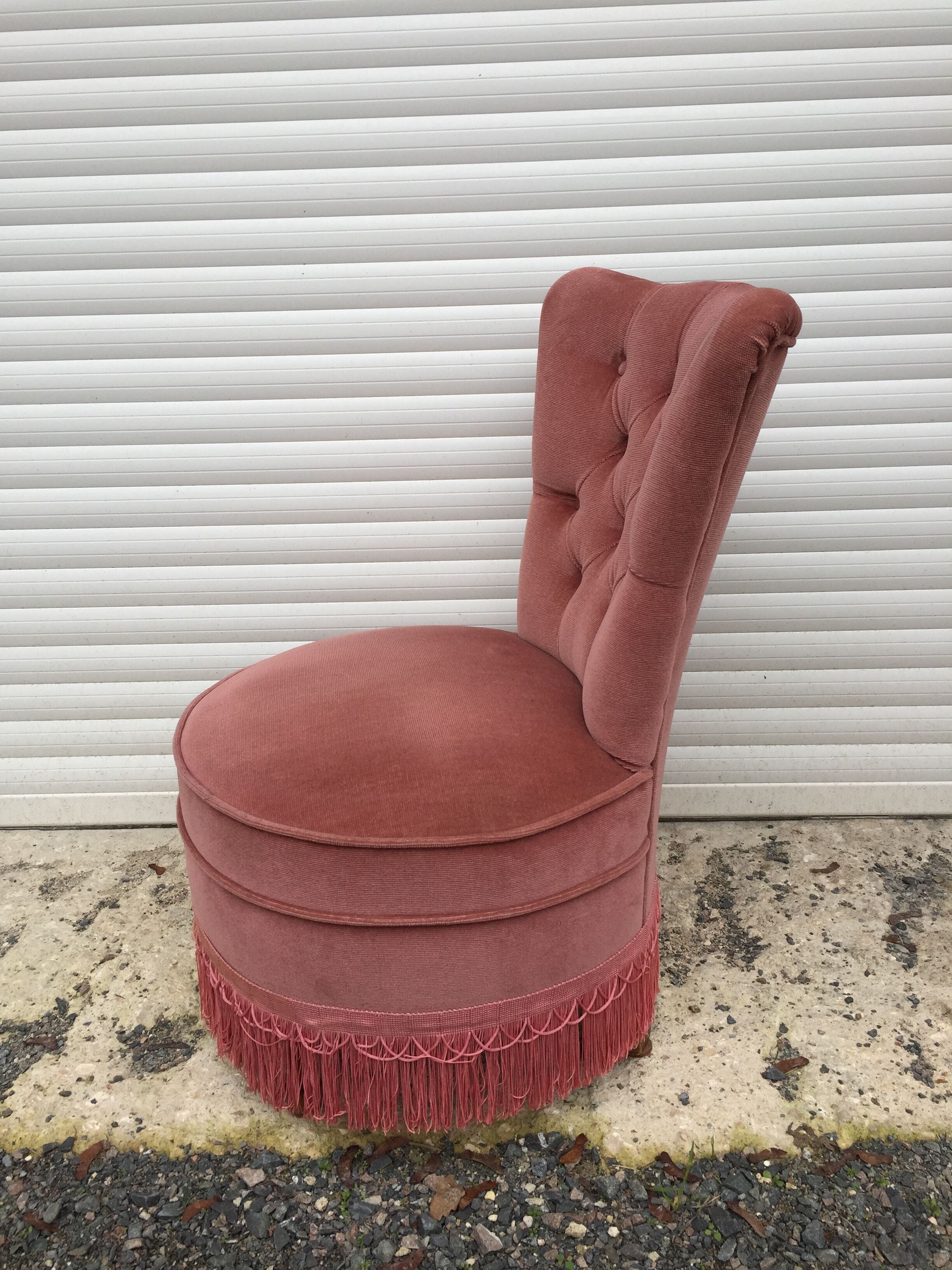 Fauteuil crapaud capitonné
