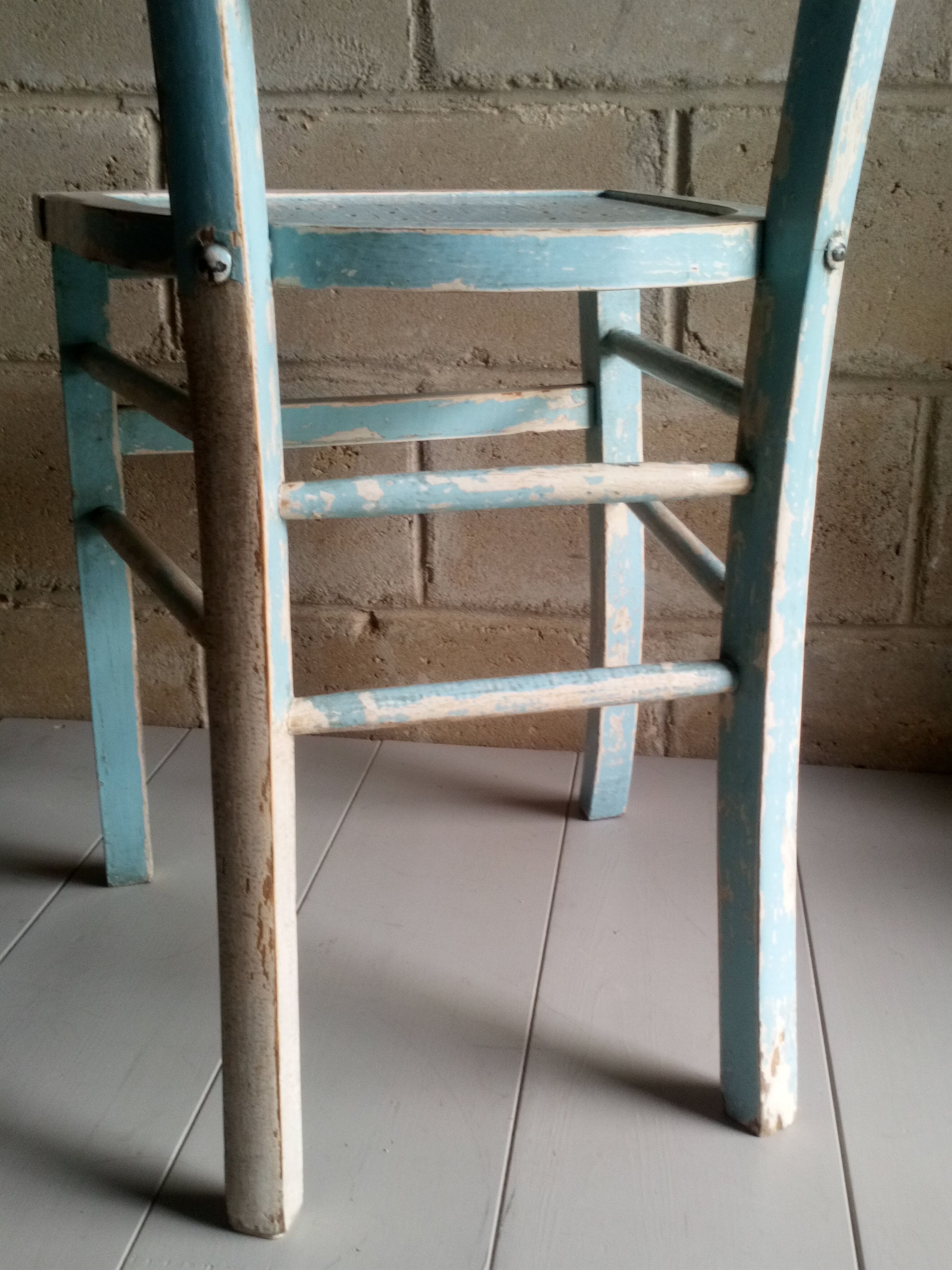 Blue and white patinated old bistro chair