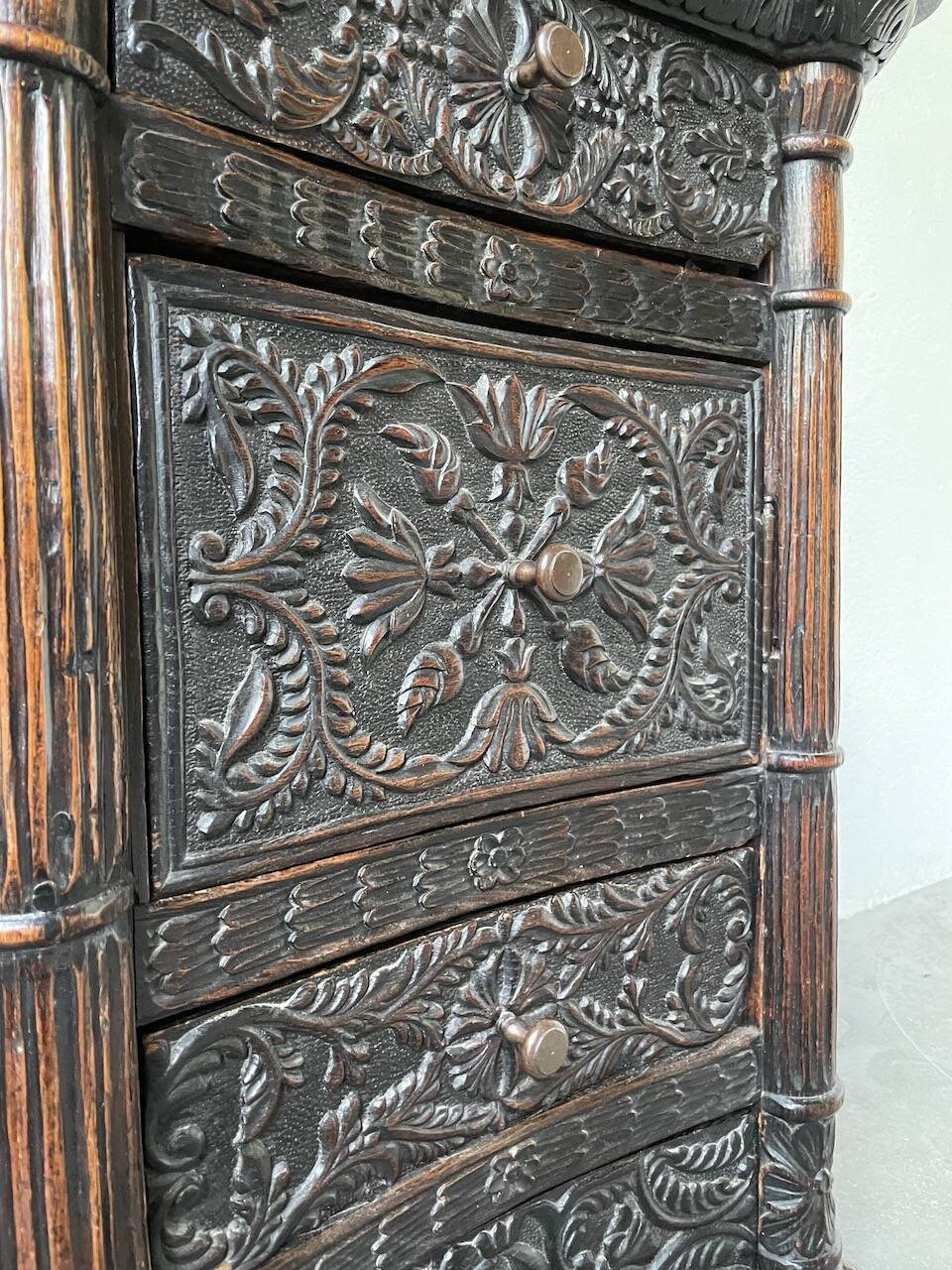 19th century chest of drawers in carved blackened pine