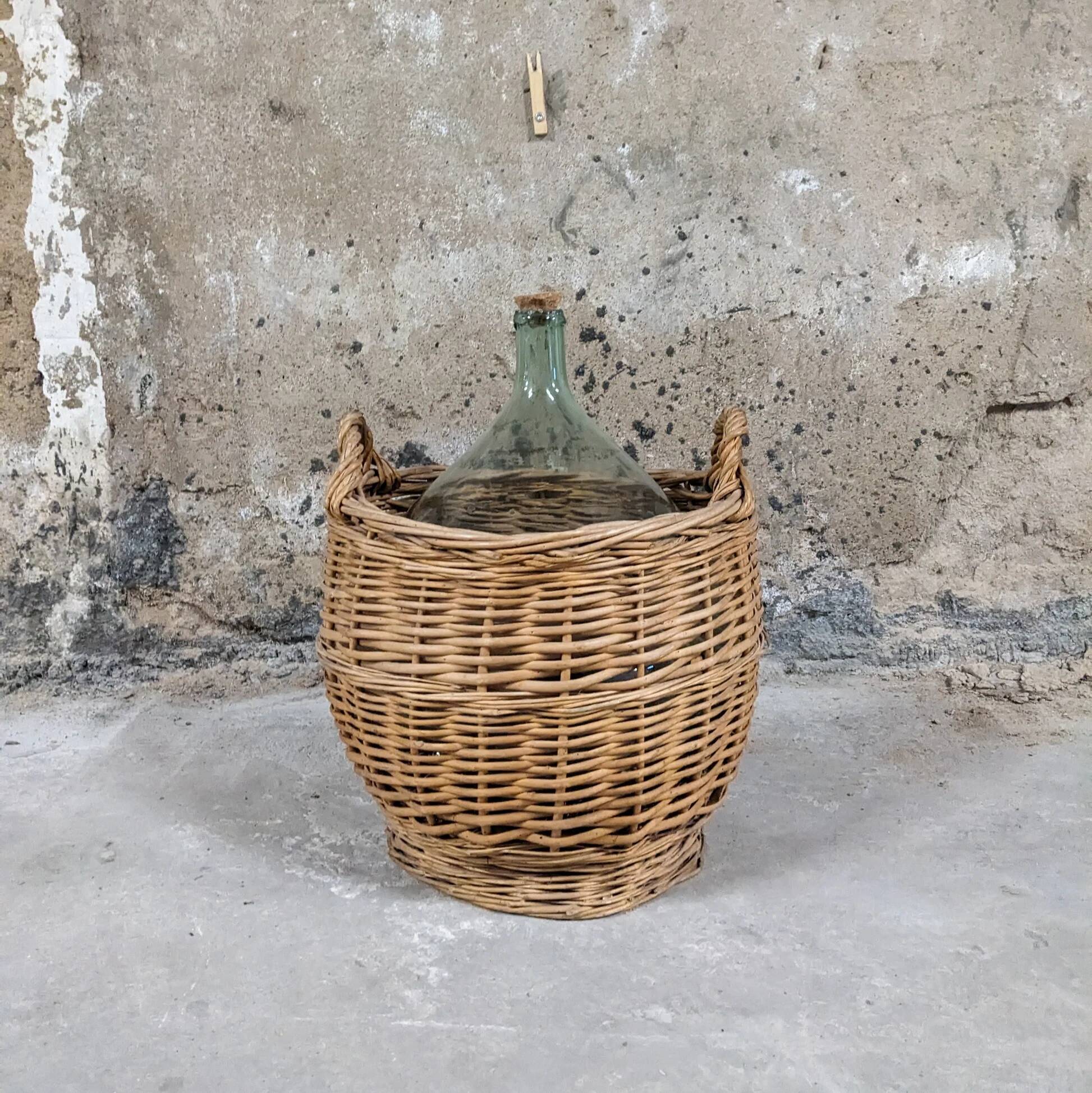 Demijohn in its wicker basket