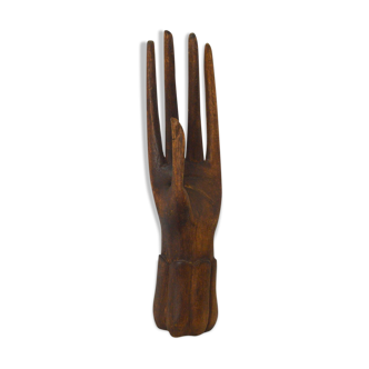Carved wooden baguier hand