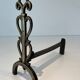 Pair of Brass and Wrought Iron Chenets with Triple Volute and Mount Torch Holders