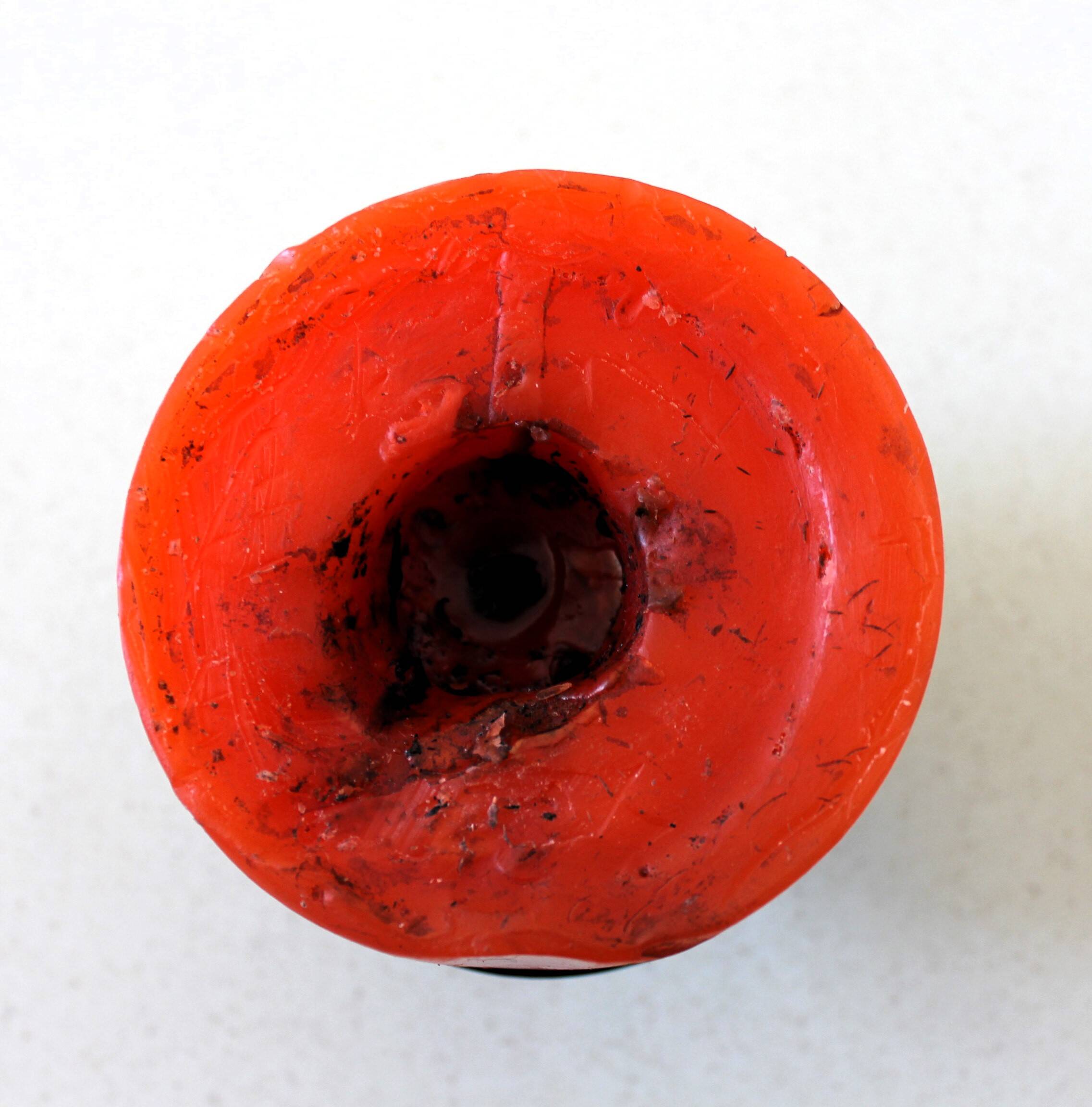 1970 wrought iron candlestick with its period coloured candle.
