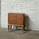 Small vintage Art Deco piece with 3 drawers, curved legs and caps.
