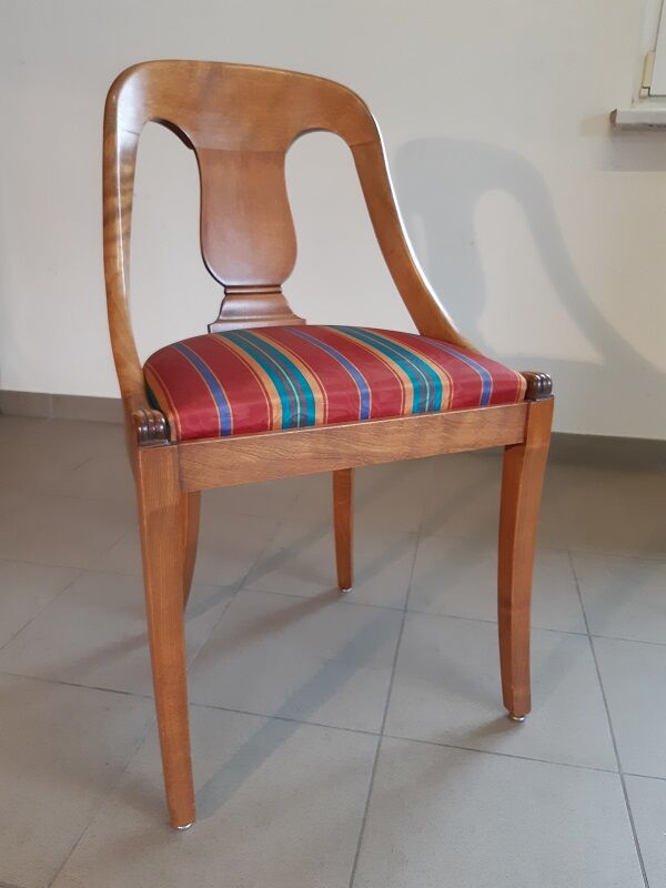 Gondola-style empire chairs