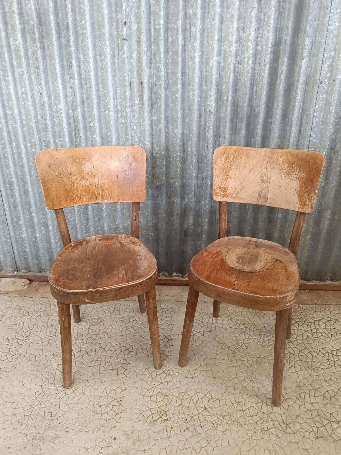 Pair of bistro chairs signed Baumann