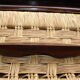 Six-drawer mahogany and straw chest of drawers, circa 1950, made in Mexico