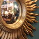 Vintage sun mirror with witch's eye mirror