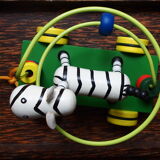 Old wooden toy, zebra car, to pull and push