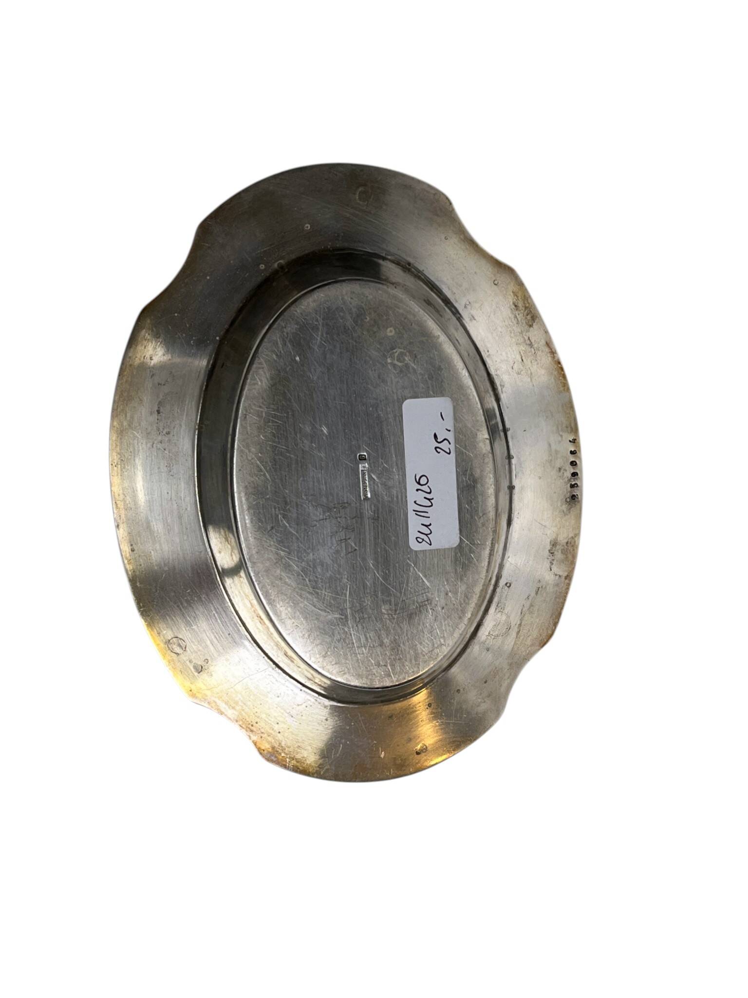 Oval metal silver-plated tray with hallmarks from the early 20th century.