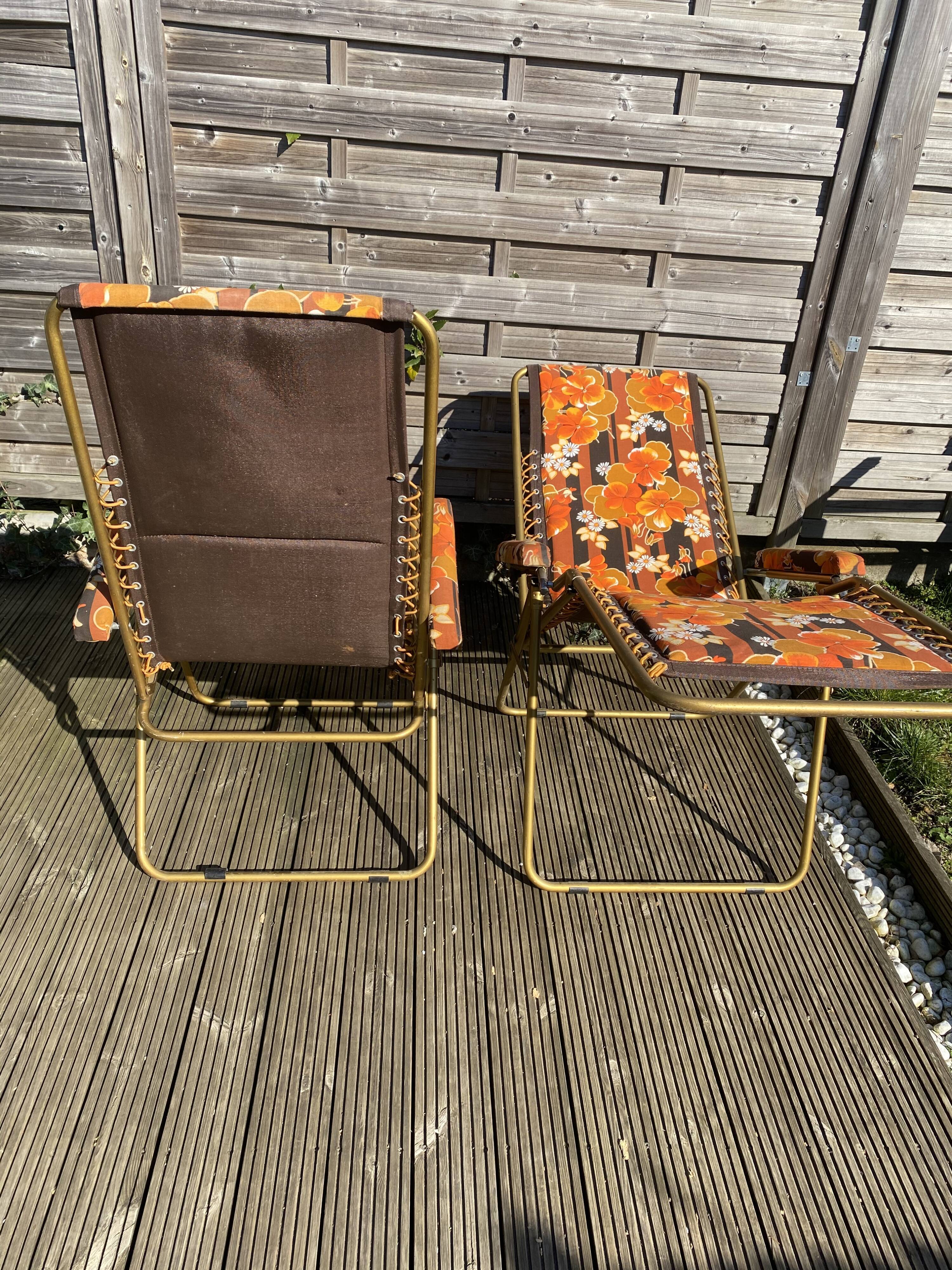 Vintage deckchairs the pair lafuma with flowers