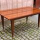 Scandinavian extendable dining table in lacquered wood and rosewood, 150cm.