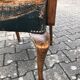 2 Dark green vintage wood and leather armchairs