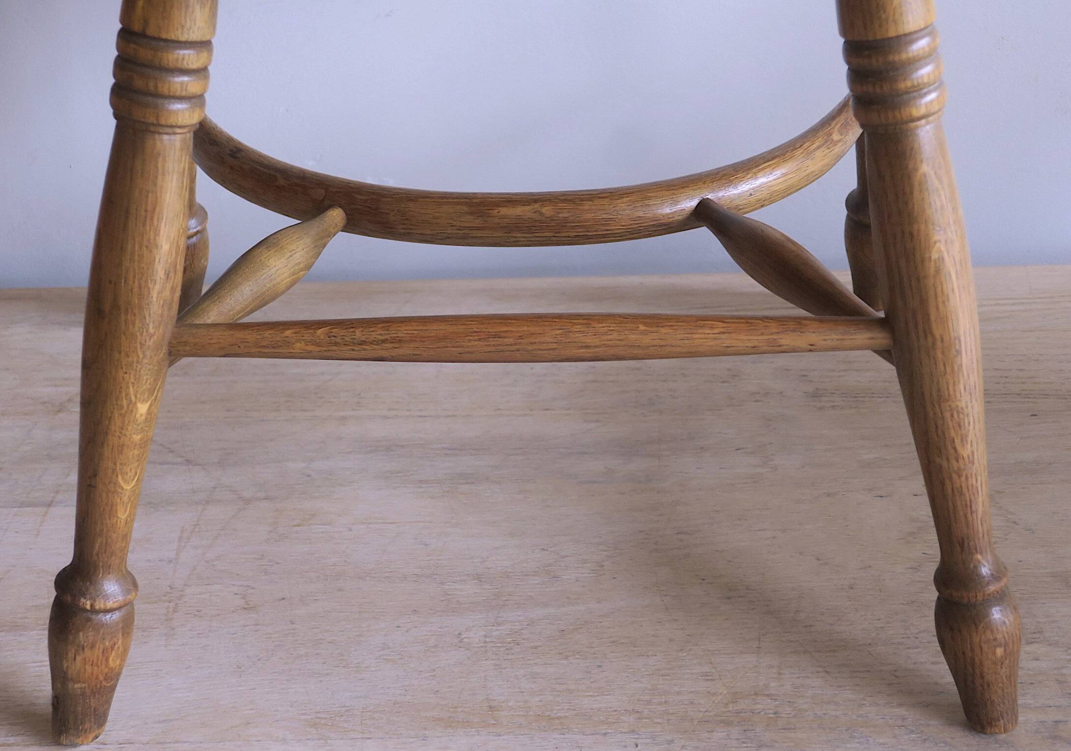 Mid century solid oak lyre-back Windsor elbow armchair, 1960s
