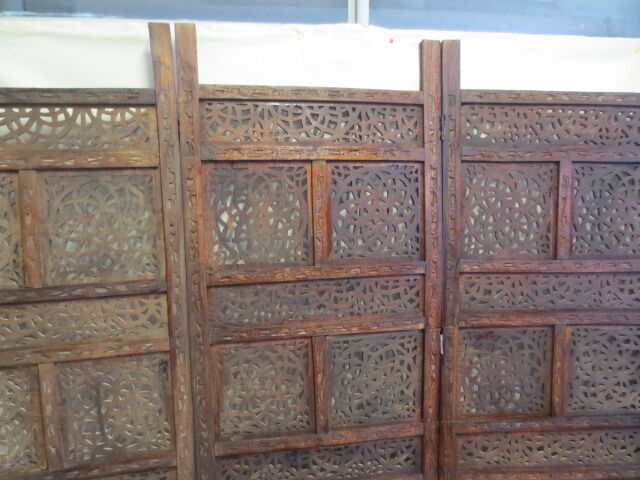 Former screen in treated exotic wood