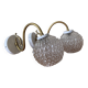 Large pair of brass swan neck wall lights with transparent glass globes.