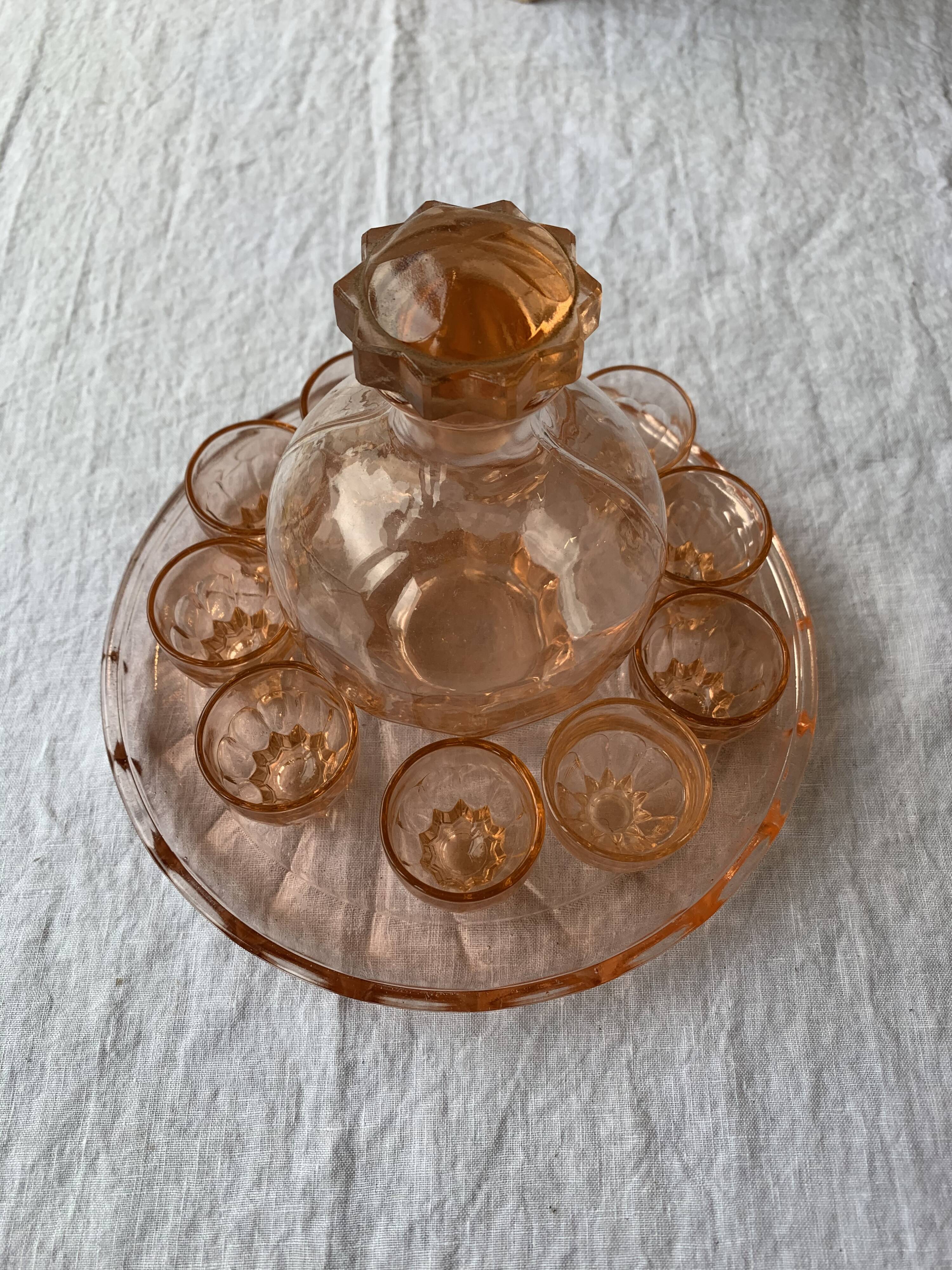 Pink glass liquor service