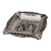 Antique silver-plated ashtray, decorated with repoussé scenes of a tavern, pin tray.
