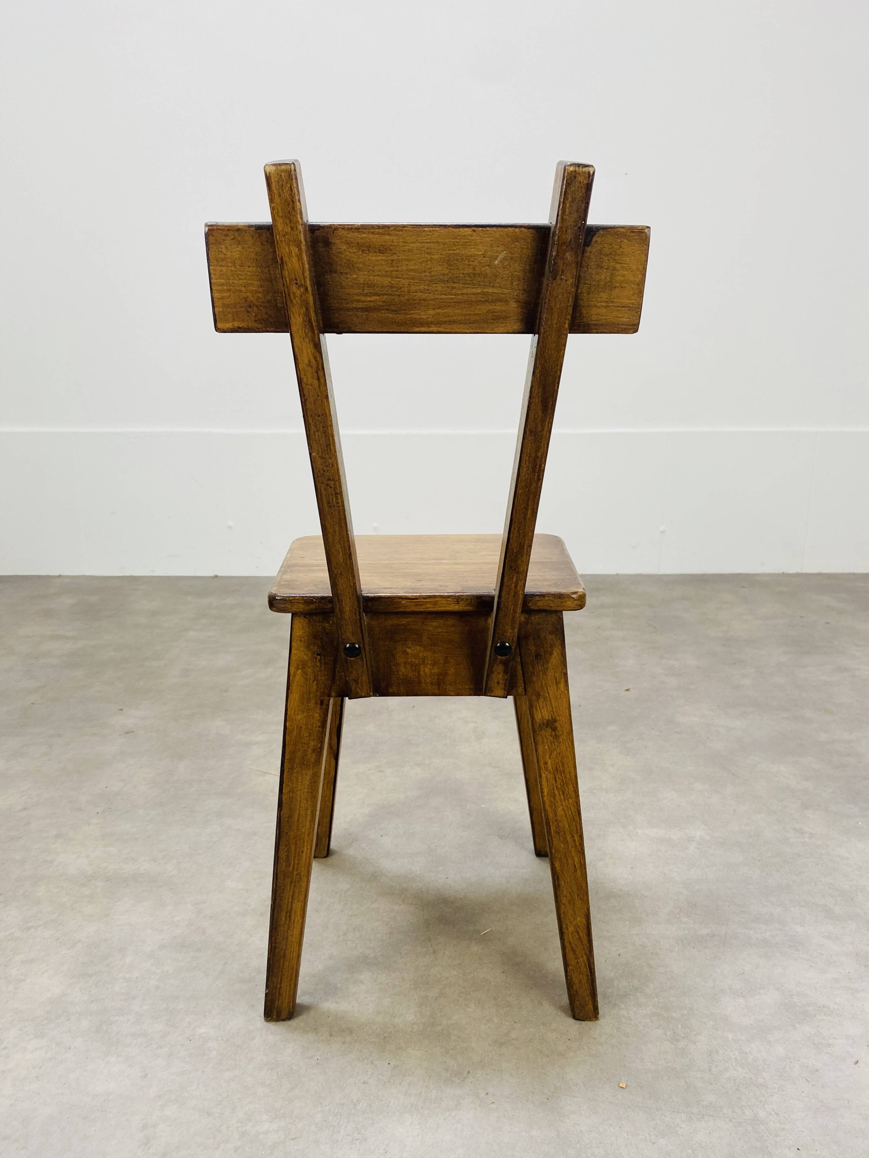 6 brutalist solid wood chairs