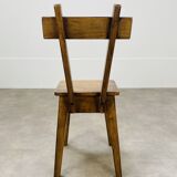 6 brutalist solid wood chairs